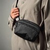 Saszetka na ramię Alpaka Flight Sling Mini 1L czarno-pomarańczowy